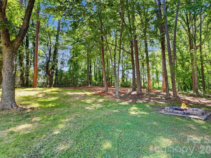4744 Hickory Grove Road, Mount Holly, NC 28120.  MLS# CAR4388986, YatesRealty ID 32776. Backyard