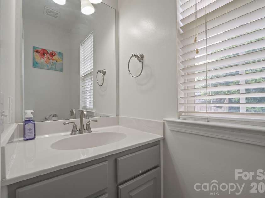 2237 Arbor Vista Drive, Charlotte, NC 28262.  MLS# CAR4395474, YatesRealty ID 32781. Half bath on main