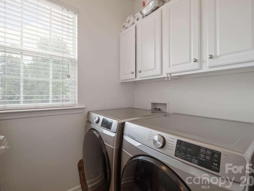 2237 Arbor Vista Drive, Charlotte, NC 28262.  MLS# CAR4395474, YatesRealty ID 32781. Laundry room on main