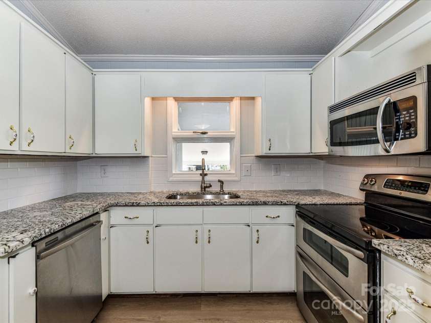 1021 Cyrus Edwards Road, Monroe, NC 28110.  MLS# CAR4287915, YatesRealty ID 32783. Kitchen