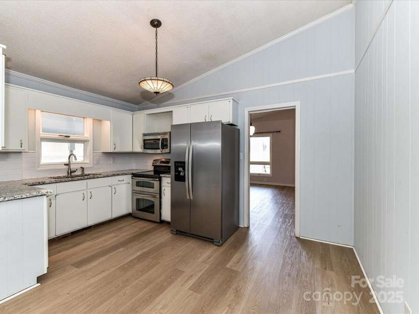 1021 Cyrus Edwards Road, Monroe, NC 28110.  MLS# CAR4287915, YatesRealty ID 32783. Kitchen/Dining