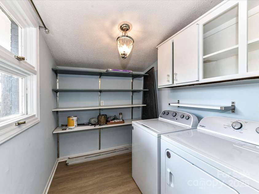 1021 Cyrus Edwards Road, Monroe, NC 28110.  MLS# CAR4287915, YatesRealty ID 32783. Laundry room w/ washer & dryer