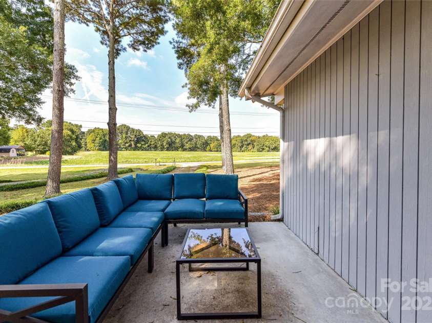 1021 Cyrus Edwards Road, Monroe, NC 28110.  MLS# CAR4314591, YatesRealty ID 32783. Side porch