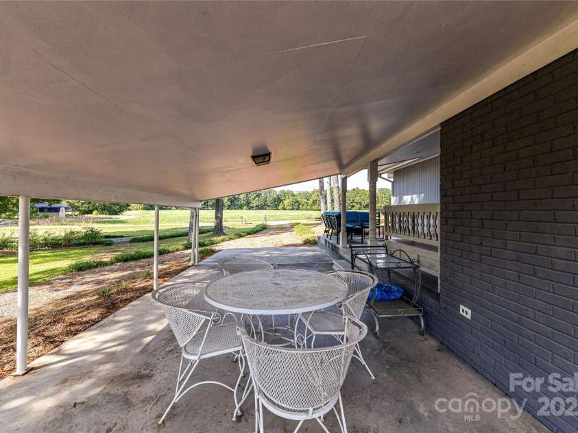 1021 Cyrus Edwards Road, Monroe, NC 28110.  MLS# CAR4314591, YatesRealty ID 32783. Side view