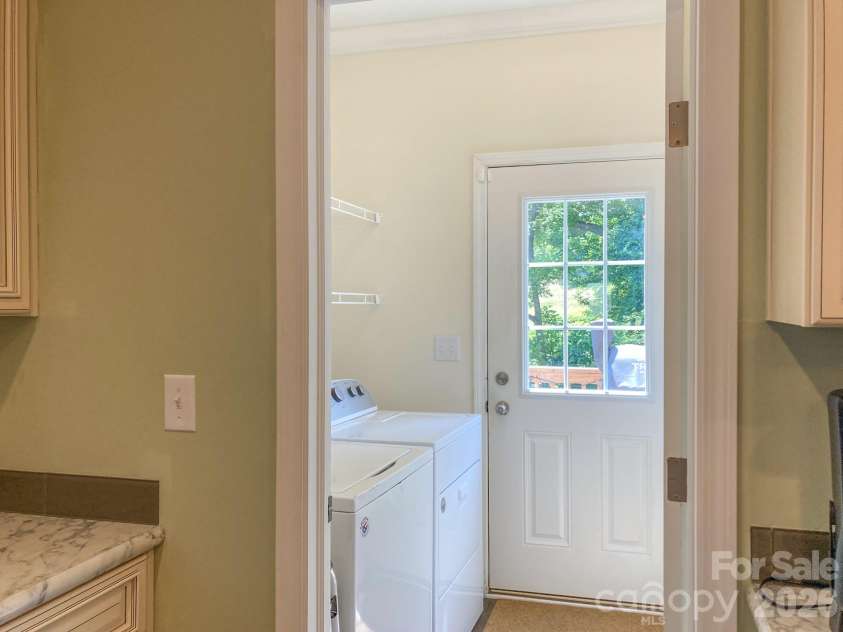 2 Clarks Chapel Extension, Weaverville, NC 28787.  MLS# CAR4393203, YatesRealty ID 32786. Laundry of Kitchen to Deck