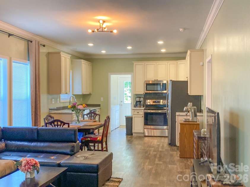 2 Clarks Chapel Extension, Weaverville, NC 28787.  MLS# CAR4393203, YatesRealty ID 32786. Living Room to Kitchen