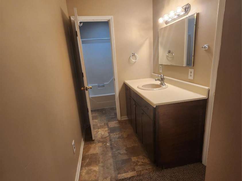 106 Maye Street, Wingate, NC 28174.  MLS# CAR4395338, YatesRealty ID 32788. Master bath sink/bathroom