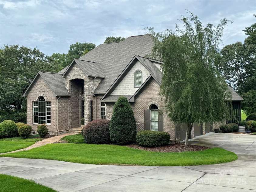 123 Stonebridge Drive, New London, NC 28127.  MLS# CAR4288975, YatesRealty ID 32789. Front of home