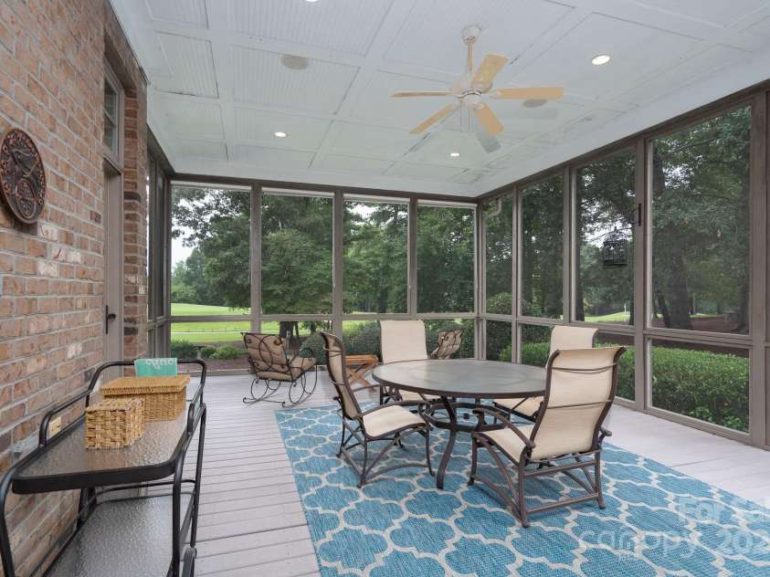 123 Stonebridge Drive, New London, NC 28127.  MLS# CAR4288975, YatesRealty ID 32789. Screened porch