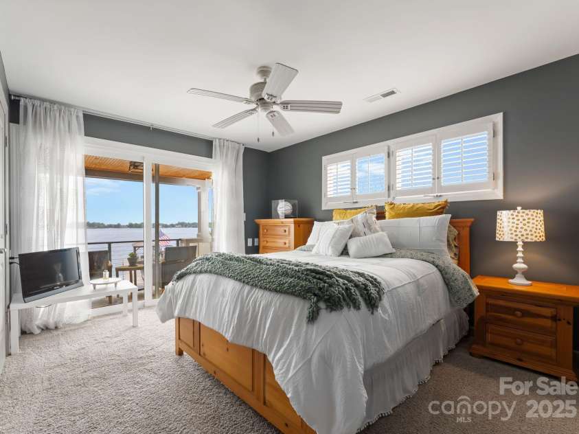 20732 Eastpoint Drive, Cornelius, NC 28031.  MLS# CAR4281277, YatesRealty ID 32793. Bedroom #2 with balcony