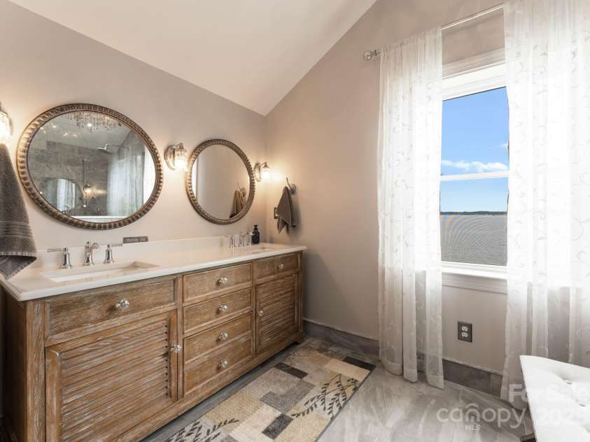 20732 Eastpoint Drive, Cornelius, NC 28031.  MLS# CAR4281277, YatesRealty ID 32793. Primary Bathroom