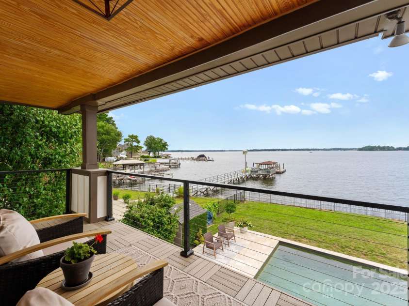 20732 Eastpoint Drive, Cornelius, NC 28031.  MLS# CAR4281277, YatesRealty ID 32793. Primary Bedroom Balcony