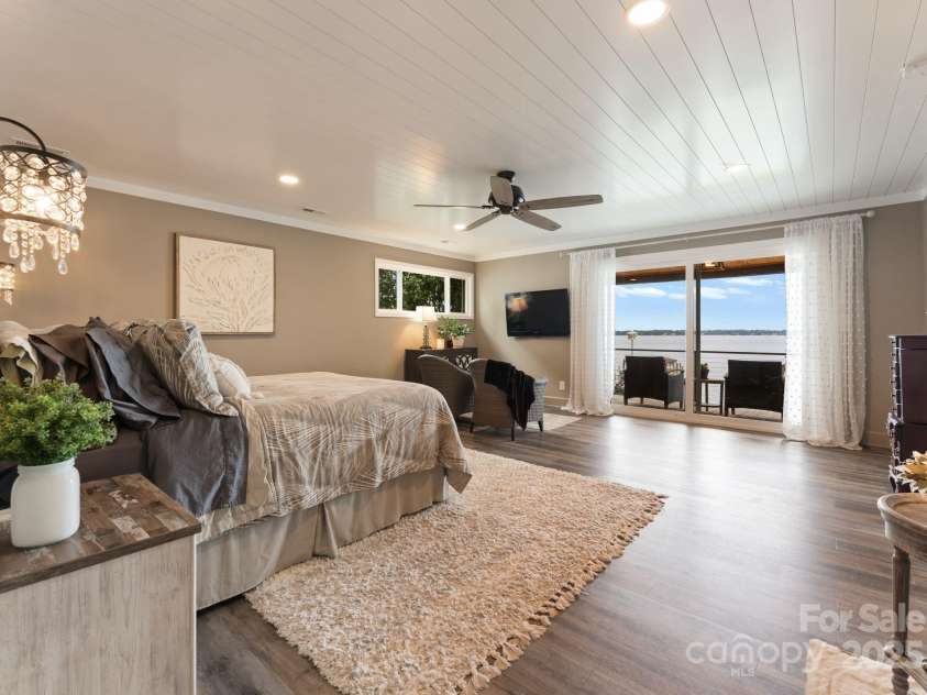 20732 Eastpoint Drive, Cornelius, NC 28031.  MLS# CAR4281277, YatesRealty ID 32793. Primary Bedroom with balcony