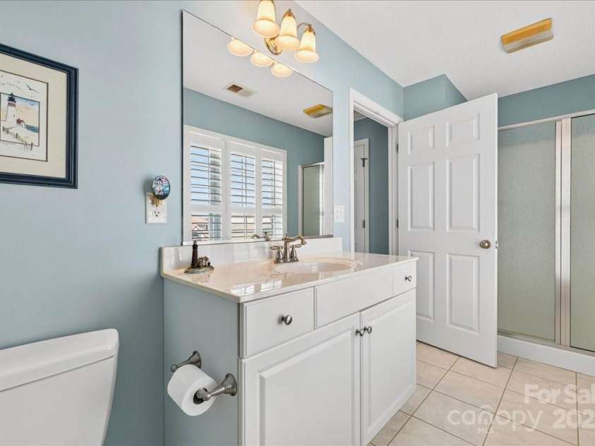 114 Second Street, Ocean Isle, NC 28469.  MLS# CAR4289418, YatesRealty ID 32794. 