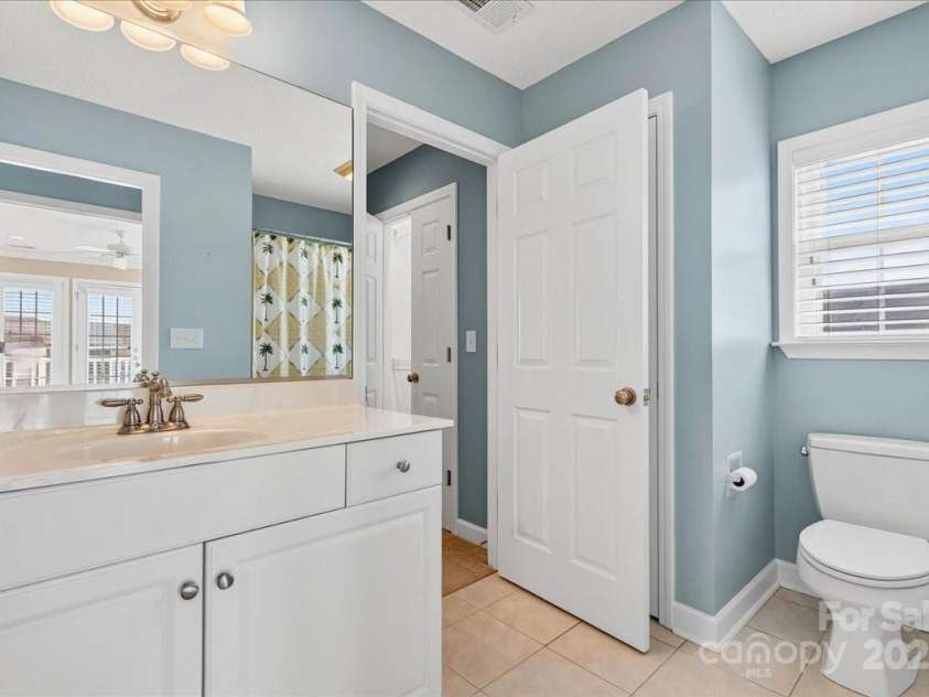 114 Second Street, Ocean Isle, NC 28469.  MLS# CAR4289418, YatesRealty ID 32794. 