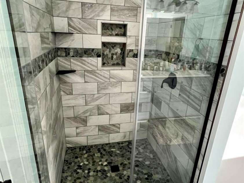 181 Alligator Drive, Fletcher, NC 28732.  MLS# CAR4387461, YatesRealty ID 32801. Gorgeous tile shower in primary bathroom