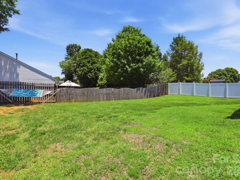 144 Golden Valley Drive, Mooresville, NC 28115.  MLS# CAR4396598, YatesRealty ID 32803. Spacious Backyard