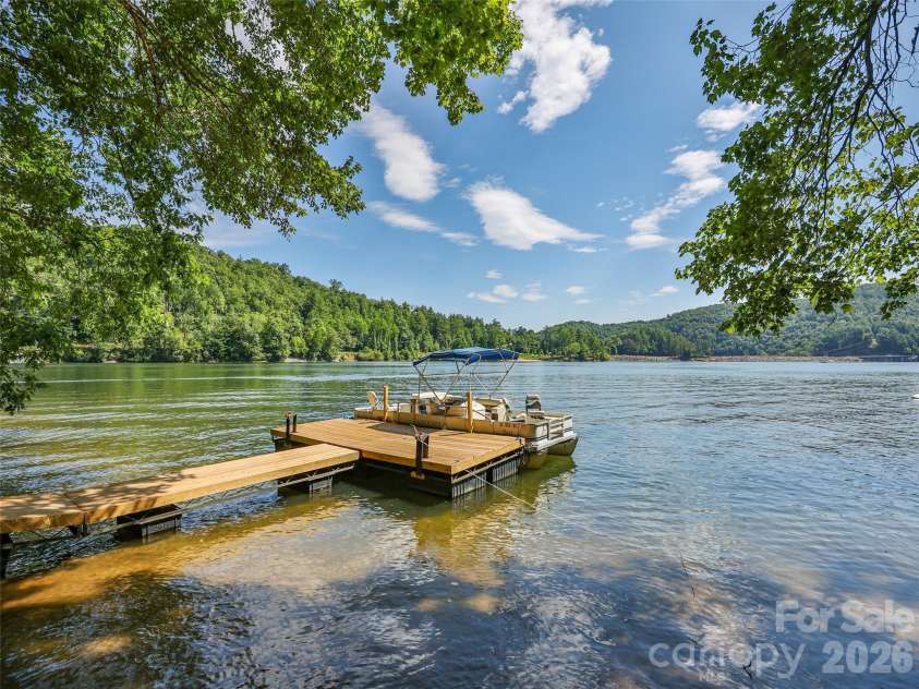 1679 Woods Mountain Trail, Cullowhee, NC 28723.  MLS# CAR4341521, YatesRealty ID 3281. Private dock on nearly 200' of lakefront