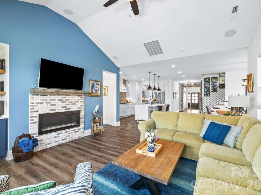 7004 Kingfisher Way, Belmont, NC 28012.  MLS# CAR4353741, YatesRealty ID 3281. Nice linear fireplace and custom builtins