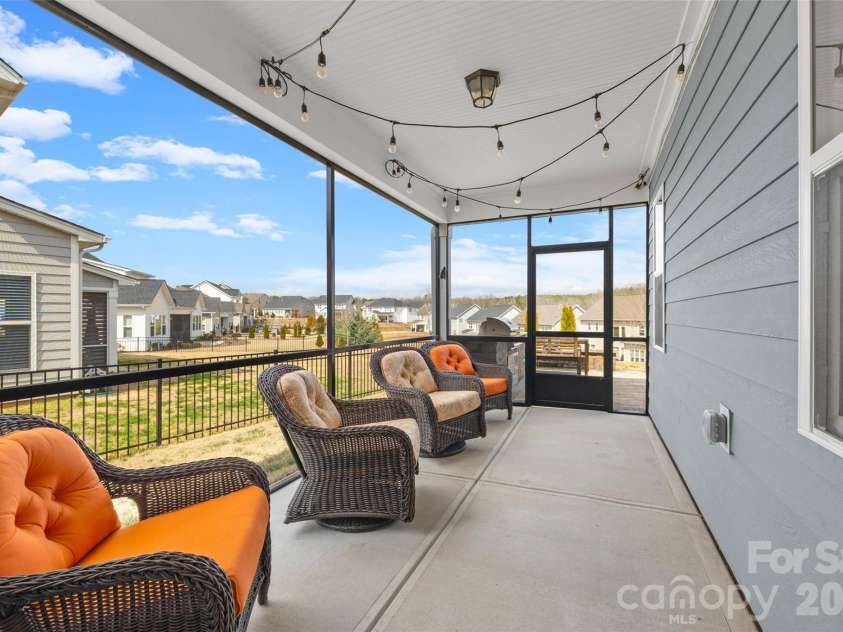 7004 Kingfisher Way, Belmont, NC 28012.  MLS# CAR4353741, YatesRealty ID 3281. Screened porch off of the dining room