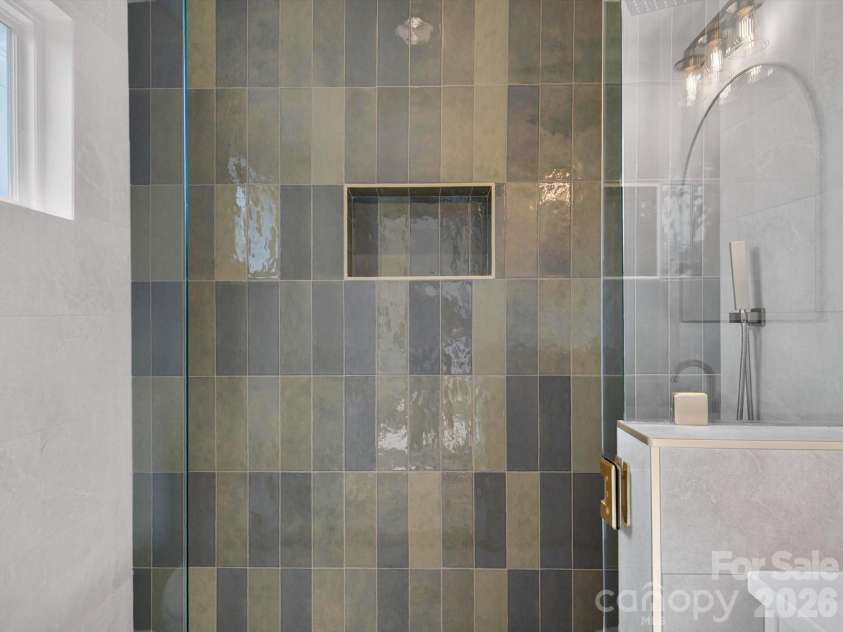 2719 Watson Drive, Charlotte, NC 28208.  MLS# CAR4398595, YatesRealty ID 32812. Custom tiled shower