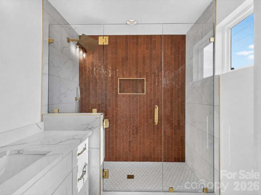 2719 Watson Drive, Charlotte, NC 28208.  MLS# CAR4398595, YatesRealty ID 32812. Designer-tiled shower