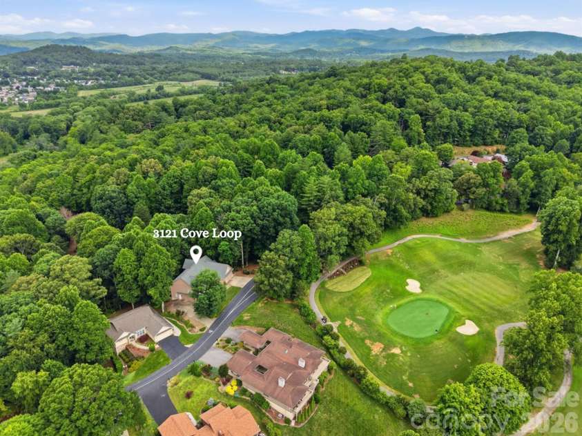3121 Cove Loop Road, Hendersonville, NC 28739.  MLS# CAR4390382, YatesRealty ID 32813. 