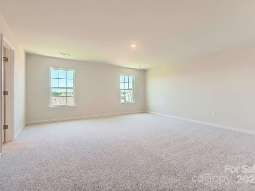 1043 Lookout Shoals Drive, Fort Mill, SC 29715.  MLS# CAR4292274, YatesRealty ID 32815. Owner's Suite (example)