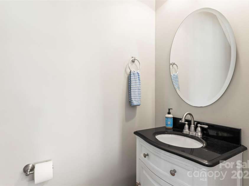 1046 Serel Drive, Matthews, NC 28104.  MLS# CAR4283202, YatesRealty ID 32816. Powder room