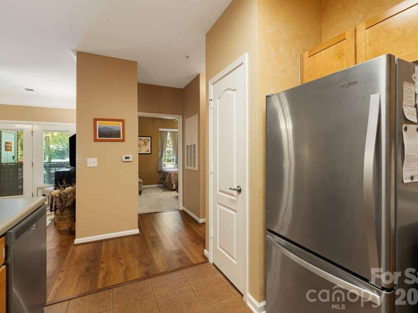 111 Appeldoorn Circle, Asheville, NC 28803.  MLS# CAR4397274, YatesRealty ID 32823. Kitchen looking into bedroom 2