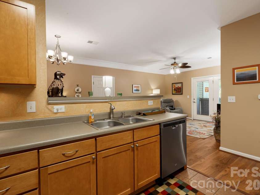 111 Appeldoorn Circle, Asheville, NC 28803.  MLS# CAR4397274, YatesRealty ID 32823. Kitchen looking into great room