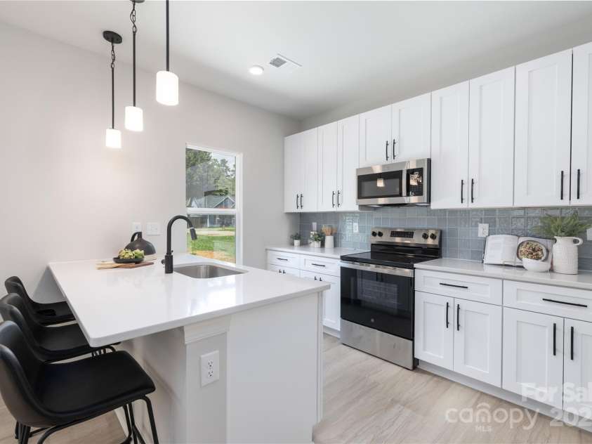 2120 A Avenue, Charlotte, NC 28216.  MLS# CAR4283659, YatesRealty ID 32825. 