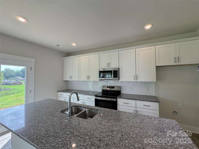107 Silverwood Court, Mooresville, NC 28115.  MLS# CAR4279215, YatesRealty ID 32827. Kitchen