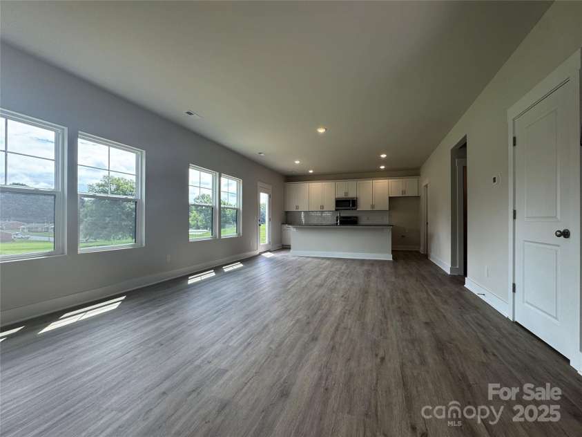 107 Silverwood Court, Mooresville, NC 28115.  MLS# CAR4279215, YatesRealty ID 32827. Living area to kitchen