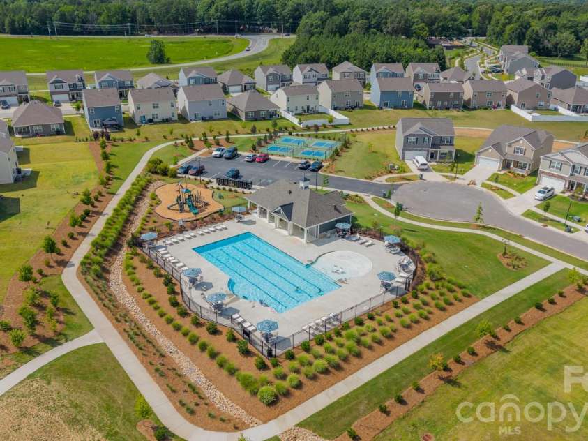 1200 Secrest Commons Drive, Monroe, NC 28112.  MLS# CAR4397398, YatesRealty ID 32828. Pool club house