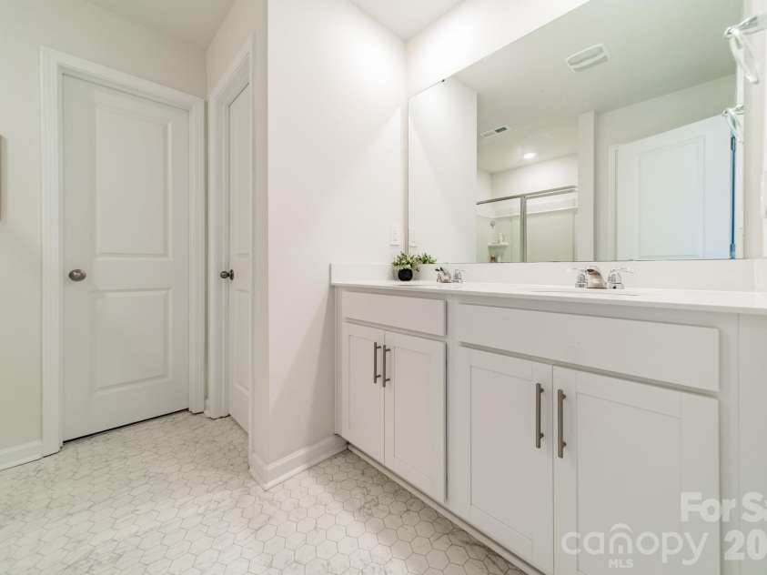 1200 Secrest Commons Drive, Monroe, NC 28112.  MLS# CAR4397398, YatesRealty ID 32828. Primary bath