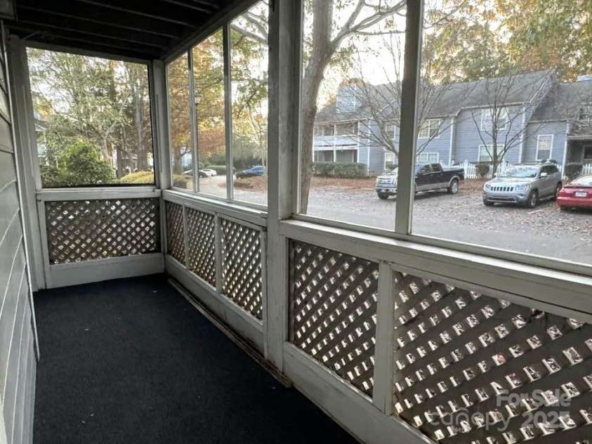 6017 Treetop Court, Charlotte, NC 28212.  MLS# CAR4200981, YatesRealty ID 3283. Screened porch