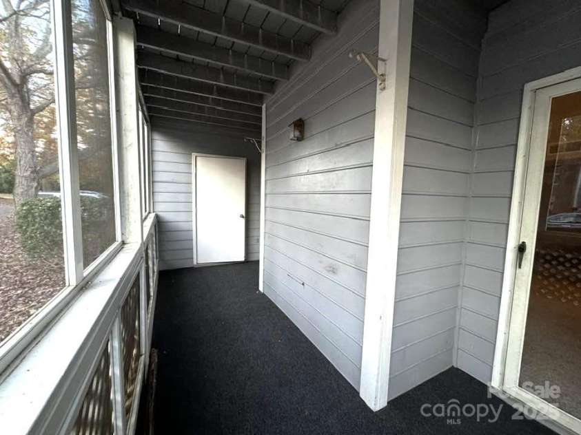 6017 Treetop Court, Charlotte, NC 28212.  MLS# CAR4200981, YatesRealty ID 3283. Screened porch