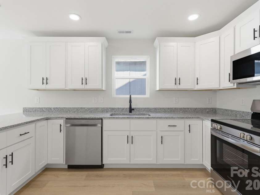 53 Young Avenue, Concord, NC 28025.  MLS# CAR4397101, YatesRealty ID 32833. Kitchen