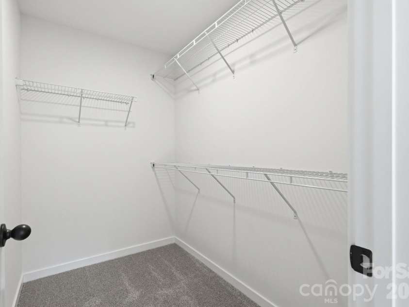 53 Young Avenue, Concord, NC 28025.  MLS# CAR4397101, YatesRealty ID 32833. Primary Bedroom's Walk-in Closet