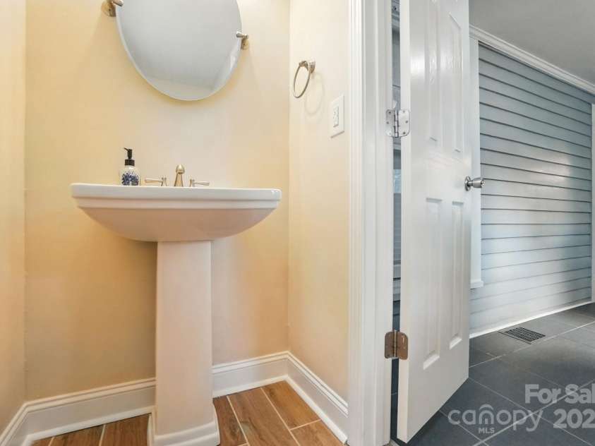 100 Ridge Avenue, Kannapolis, NC 28083.  MLS# CAR4286009, YatesRealty ID 32834. 1/2 bath on main 