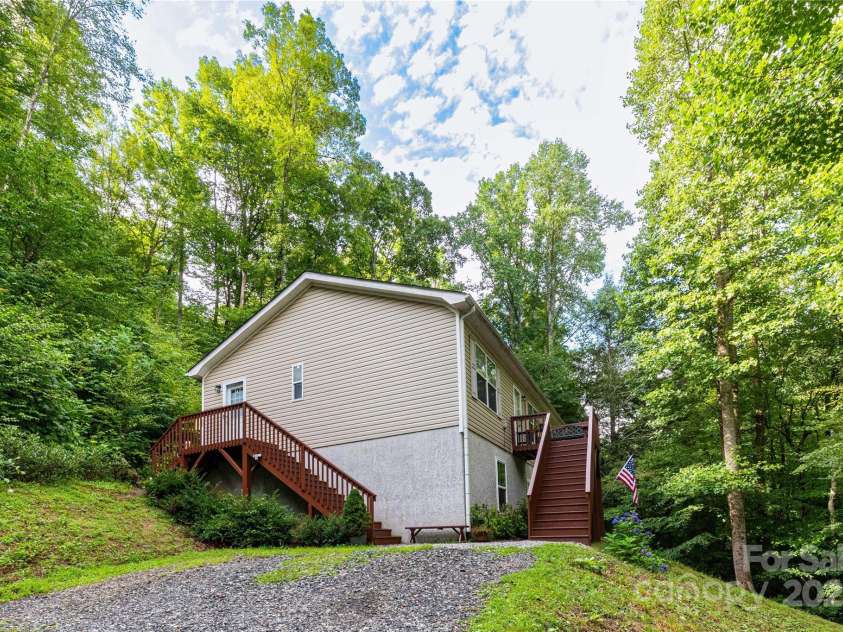 100 Susanna Cove Road, Mars Hill, NC 28754.  MLS# CAR4288018, YatesRealty ID 32835. 2 parking spots at side porch