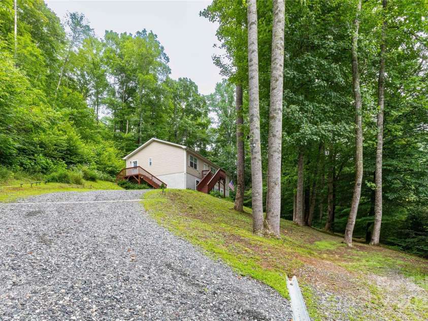 100 Susanna Cove Road, Mars Hill, NC 28754.  MLS# CAR4288018, YatesRealty ID 32835. Extra parking spot at bottom of driveway