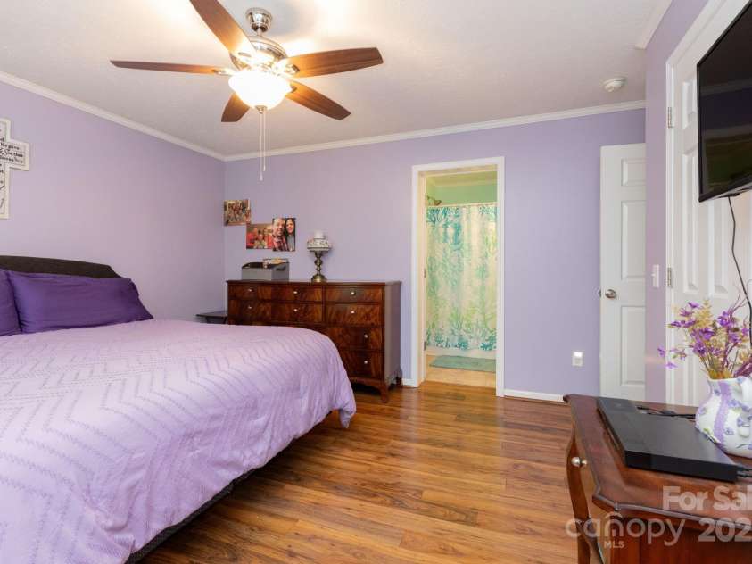 100 Susanna Cove Road, Mars Hill, NC 28754.  MLS# CAR4288018, YatesRealty ID 32835. Primary bedroom with ensuite bath