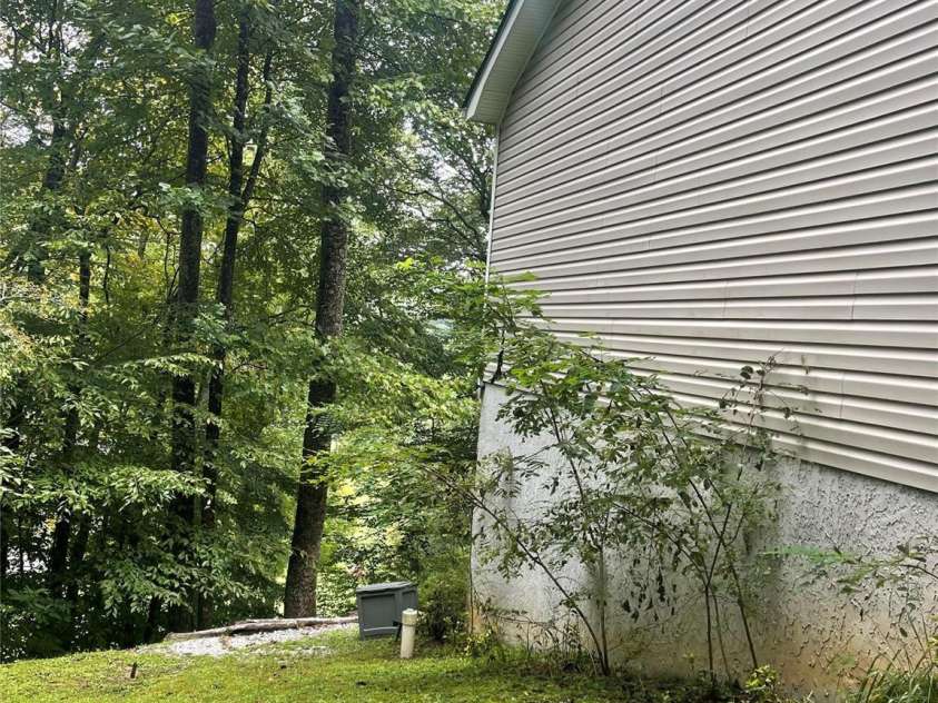 100 Susanna Cove Road, Mars Hill, NC 28754.  MLS# CAR4288018, YatesRealty ID 32835. Septic in side yard