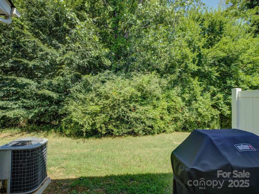 1916 Aston Mill Place, Charlotte, NC 28273.  MLS# CAR4278175, YatesRealty ID 32838. Rear patio view