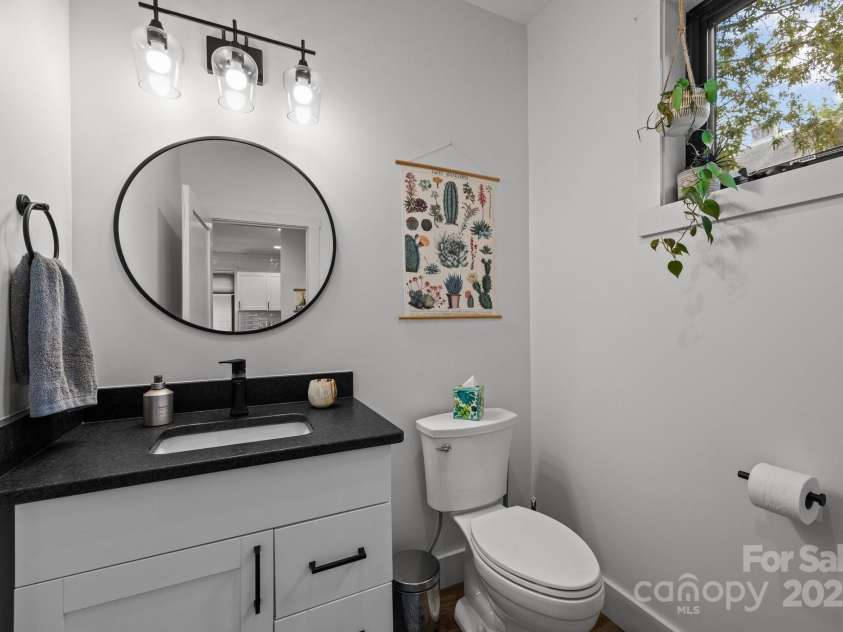 104 Deaver Street, Asheville, NC 28806.  MLS# CAR4268895, YatesRealty ID 32839. Main level half bath