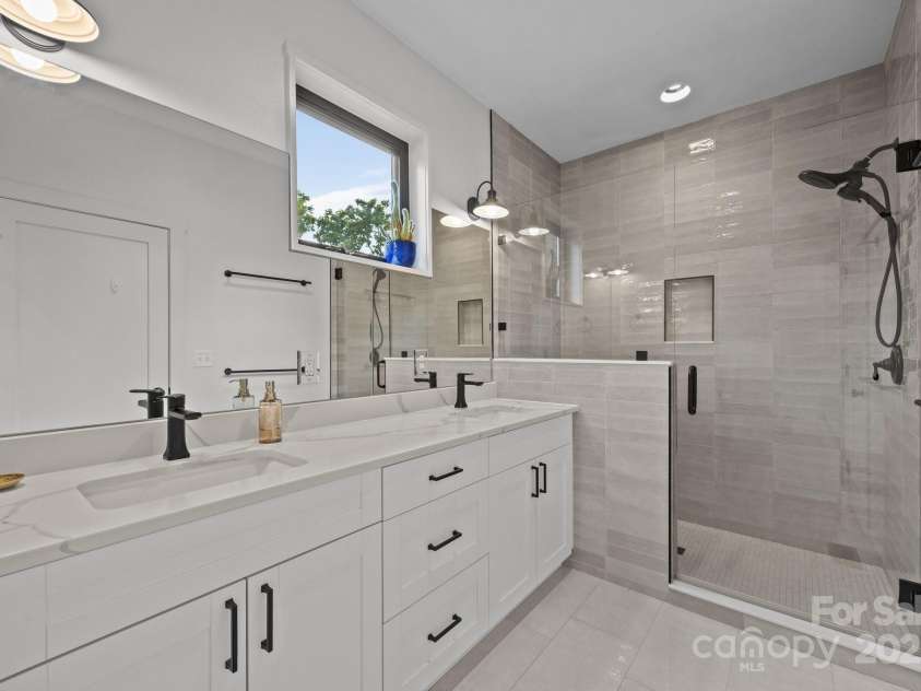 104 Deaver Street, Asheville, NC 28806.  MLS# CAR4268895, YatesRealty ID 32839. Primary en suite bathroom