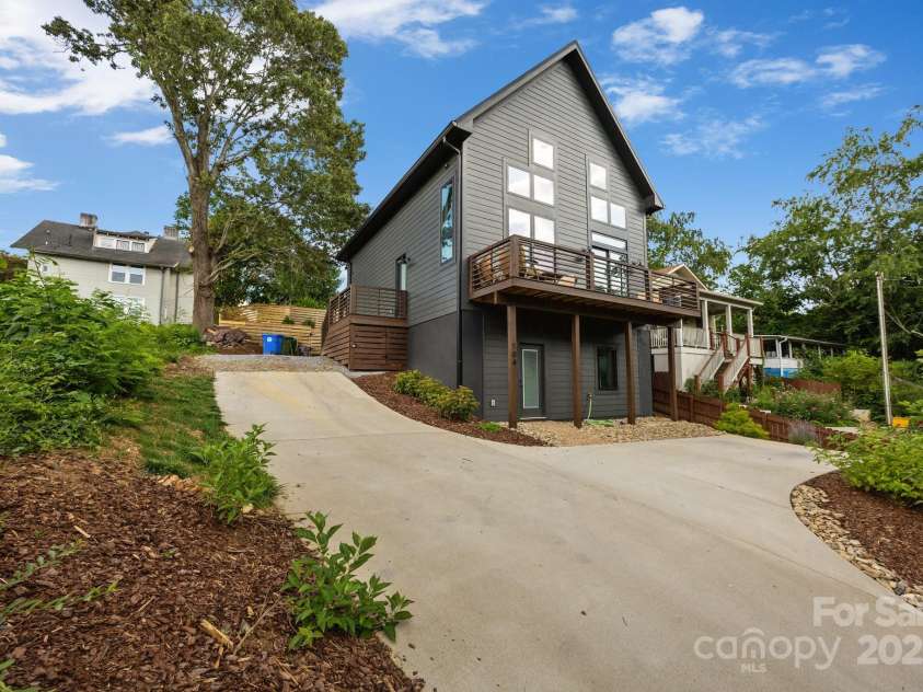 104 Deaver Street, Asheville, NC 28806.  MLS# CAR4268895, YatesRealty ID 32839. Space for 4-5 cars!
