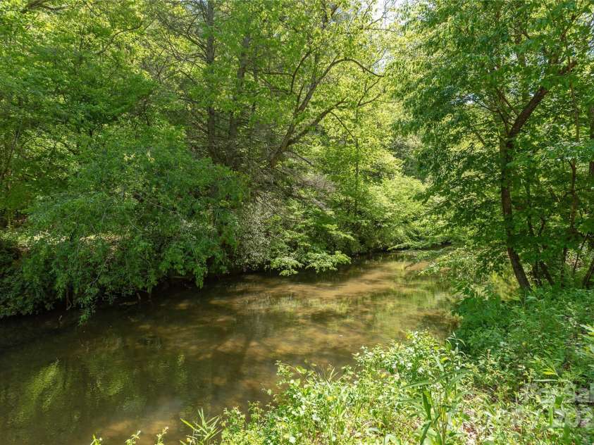 458 Rio Verde Drive, Zirconia, NC 28790.  MLS# CAR4289067, YatesRealty ID 32844. There's some great spots to catch trout here.